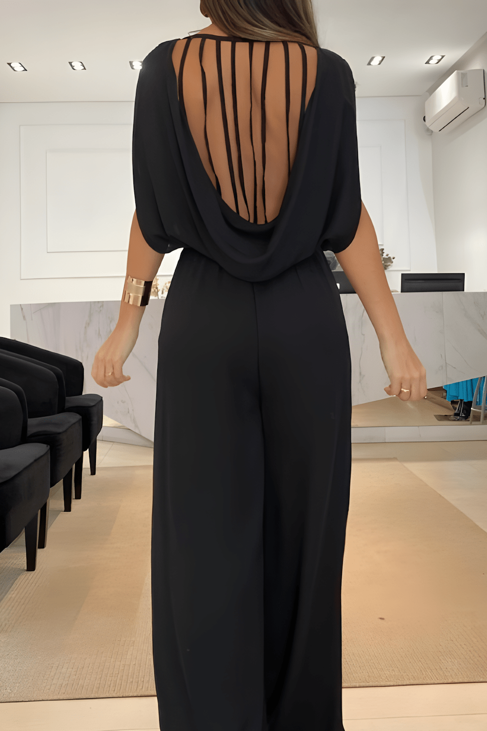 EMELIA | Sleeveless jumpsuit with flared legs 2