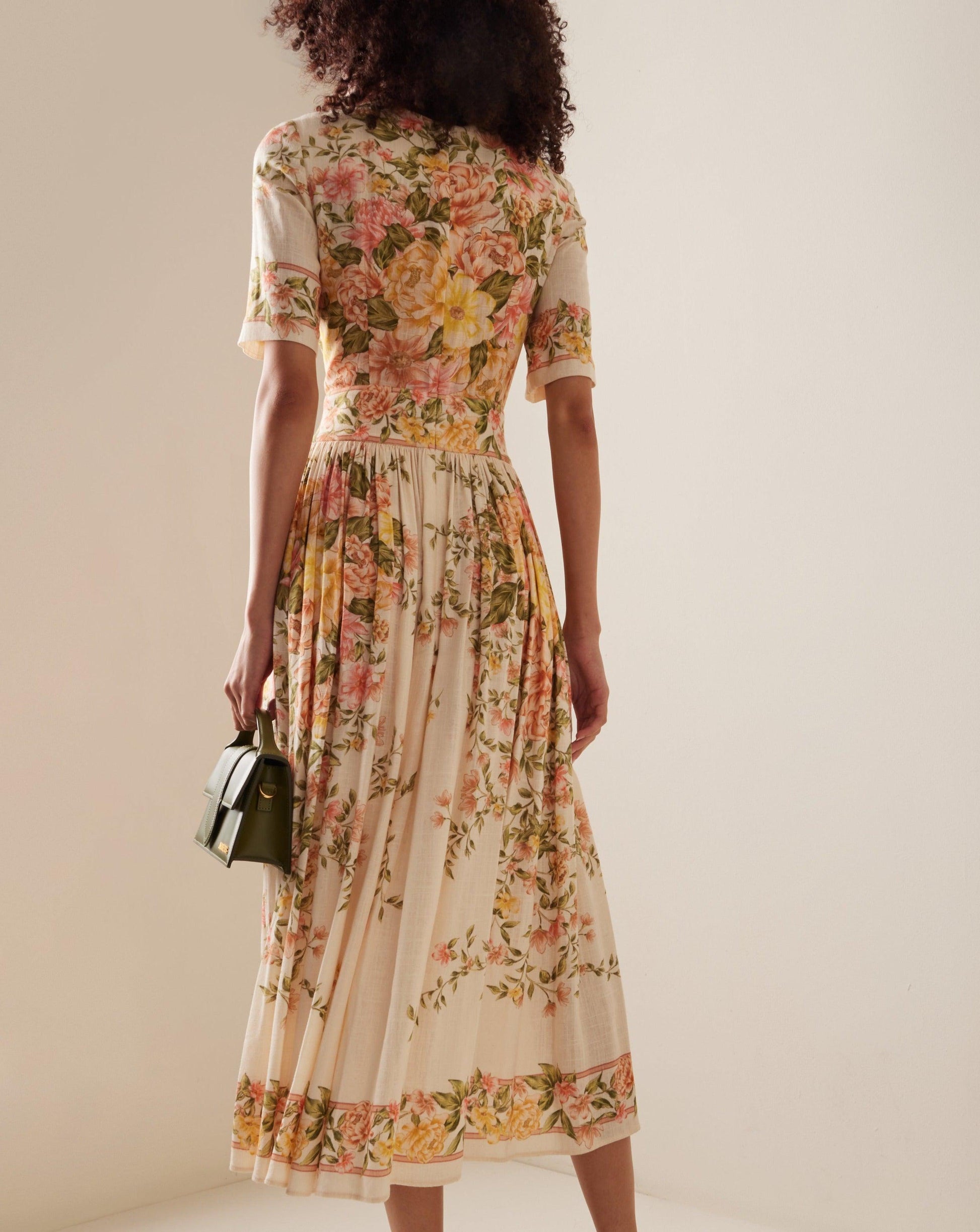 FLORLLA | Floral midi dress with elegant flair 4
