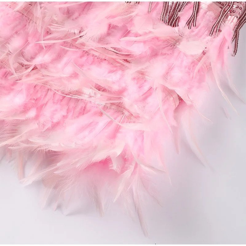 LÉONA | Cocktail dress with sequins and feather accents 7