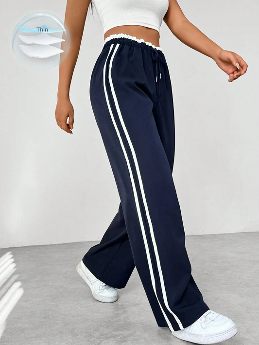 Liora | Sporty Women's Track Pants with Stripes 0