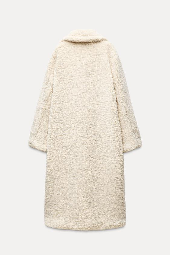 Long Women's Winter Coat Made of Soft Teddy Fabric with Lapel Collar and Side Pockets for Extra Warmth and Comfort 2