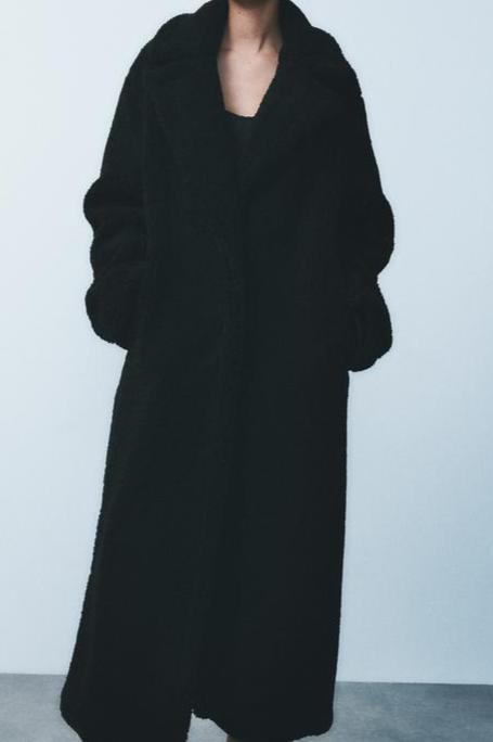 Long Women's Winter Coat Made of Soft Teddy Fabric with Lapel Collar and Side Pockets for Extra Warmth and Comfort 8