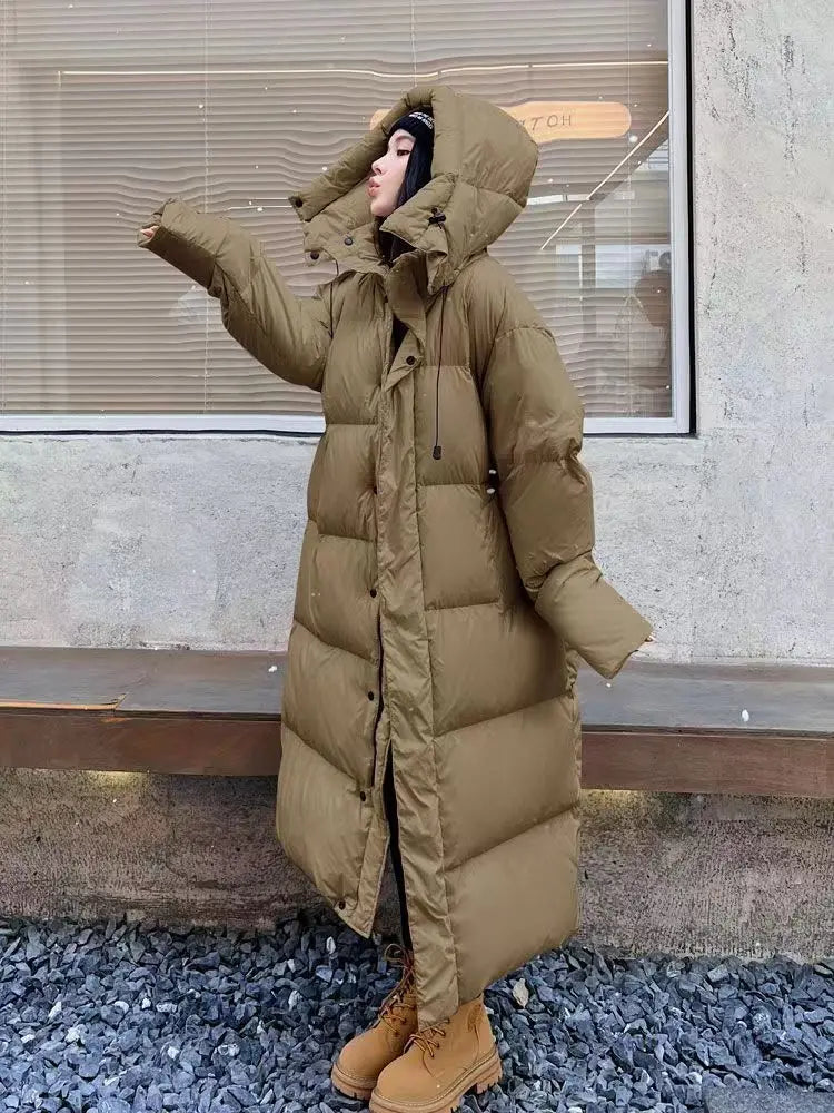 Long Women's Winter Coat Padded with Hood - Windproof and Comfortable for Cold Days 0